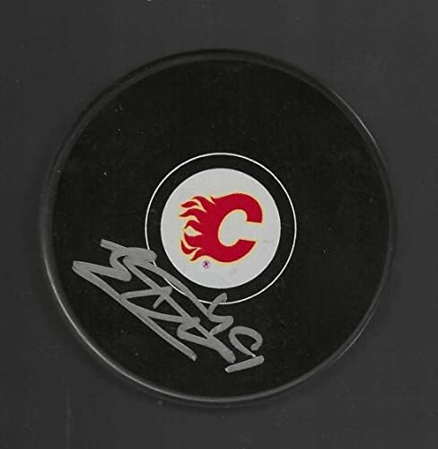 Миене на Якоб Пелетие с автограф Калгари Флеймс - за миене на НХЛ с автограф